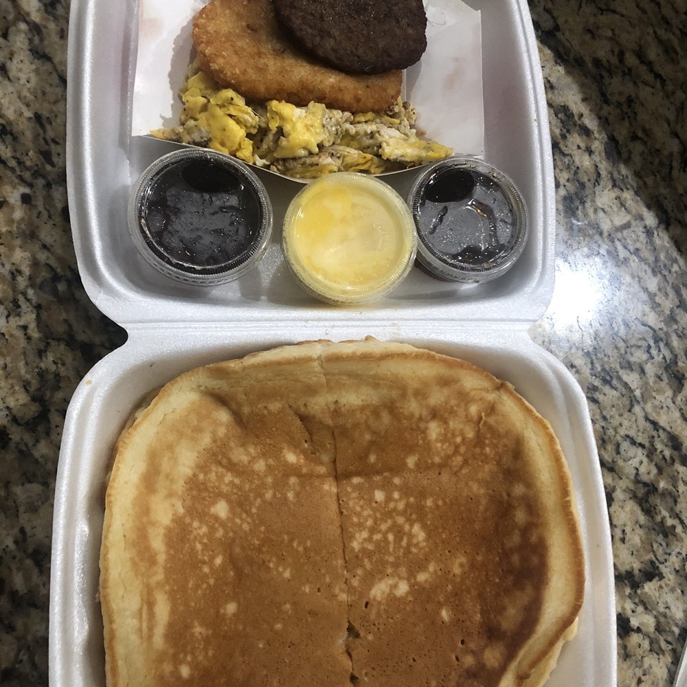 a breakfast of pancakes and eggs
