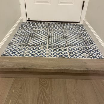 Andro Pinto Flooring - Adding this beautiful distressed tile instead of wood flooring to our back entrance was a master stroke, giving us a mini mud room - Flooring Near Me - Menlo Park, California