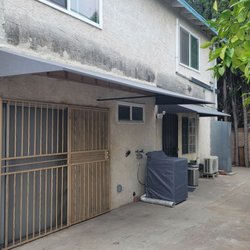 Sun Awning - Alternative to a patio. Covering my washer and dryer