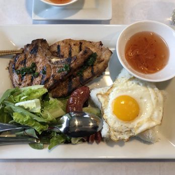 Pho Tam - Pork deluxe (pork chops, rice, egg, Chinese sausage, salad greens) - Vietnamese Near Me - Niles, Illinois Pho Tam - Pork deluxe (pork chops, rice, egg, Chinese sausage, salad greens) - Vietnamese Near Me - Niles, Illinois