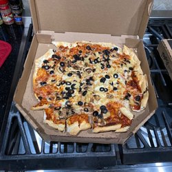 Mazzio's Pizza & Wings - Olives pineapple mushroom pizza, I think?