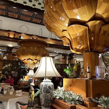 The Plum Blossom - Lovely wood sculptures - Seafood Near Me - Troy, New York The Plum Blossom - Lovely wood sculptures - Seafood Near Me - Troy, New York
