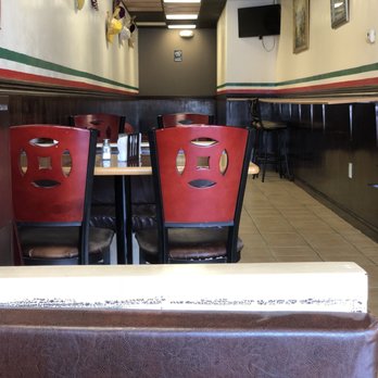 Taqueria Coco Loco - tables and chairs in a restaurant - Mexican Near Me - Chalmette, Louisiana Taqueria Coco Loco - tables and chairs in a restaurant - Mexican Near Me - Chalmette, Louisiana
