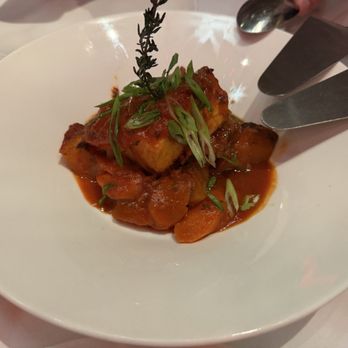 Avra - CHILEAN SEA BASS "PLAKI" oven baked with vidalia onions, potato, herbs, light tomato fish broth - Greek Near Me - Dallas, Texas
