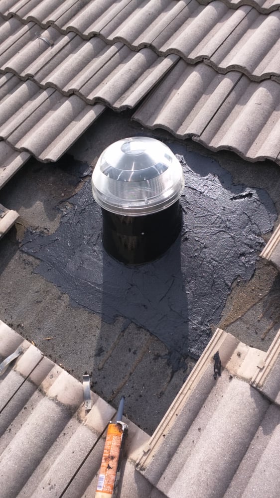 Slide of Riggs Roofing