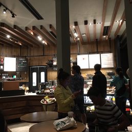 a group of people in a coffee shop a group of people in a coffee shop