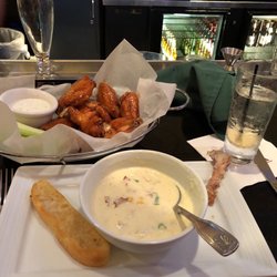 Their wings with bourbon and Korean bbq sauce is delicious and the crab and corn chowder mmm good. My usual corporate drink was well made.
