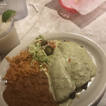 Chuy's - Steak enchiladas w/ deluxe tomatillo sauce. House grande margarita. - Tex-Mex Near Me - Jacksonville, Florida Chuy's - Steak enchiladas w/ deluxe tomatillo sauce. House grande margarita. - Tex-Mex Near Me - Jacksonville, Florida