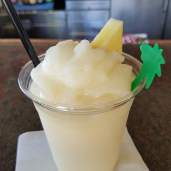 Hau Tree Bar - Pina Colada - Local Flavor Near Me - Honolulu, Hawaii