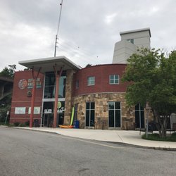 Outdoor Knoxville - Outdoor Knoxville Adventure Center: The Beer Porch and visitor info inside.
