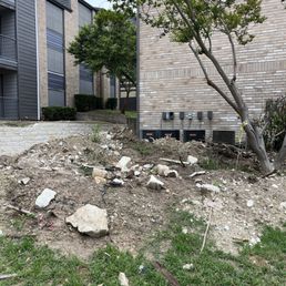 Pile of rubble left for 5 months by "landscaping" company Pile of rubble left for 5 months by "landscaping" company