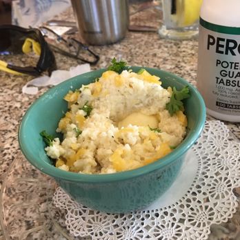 Wildflower Cafe - Cheesy Grits -These are flavored with garlic, and sprinkled with parsley - Breakfast & Brunch Near Me - Clearwater, Florida Wildflower Cafe - Cheesy Grits -These are flavored with garlic, and sprinkled with parsley - Breakfast & Brunch Near Me - Clearwater, Florida