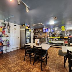 Peanut's Steak and Seafood - Dining room and counter.