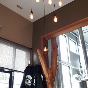 Sooke Brewing Company - a t - shirt hanging from the ceiling - Breweries Near Me - Sooke, British Columbia