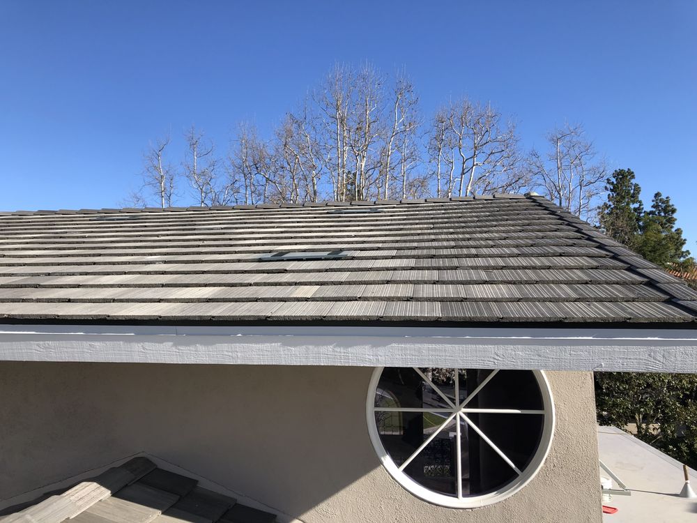 Slide of Leon K Miller Roofing