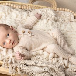 Nicole Jackson Photography - Handsome baby boy at Nicole Jackson Photography. Wearing a studio outfit in our boho moses basket
