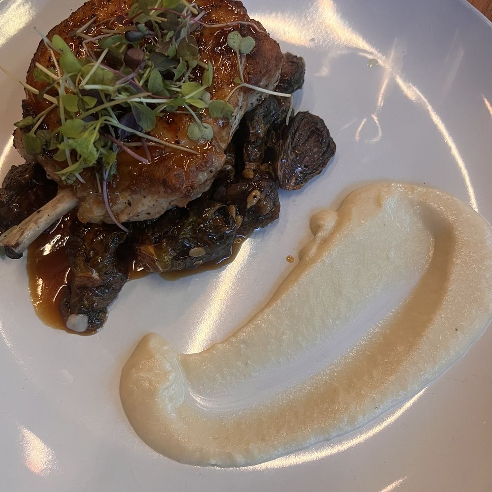 BONE IN PORK CHOP with Brussels sprouts and cauliflower purée BONE IN PORK CHOP with Brussels sprouts and cauliflower purée