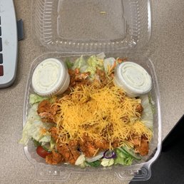 a salad in a plastic container a salad in a plastic container