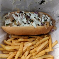 Saucy Dogs-Burgers-Tenders - Caribbean Dog with fries.