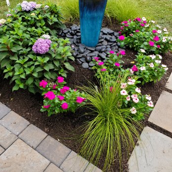 Greenleaf Lawn and Landscape Inc - a fountain surrounded by flowers - Landscaping Near Me - Pennington, New Jersey Greenleaf Lawn and Landscape Inc - a fountain surrounded by flowers - Landscaping Near Me - Pennington, New Jersey