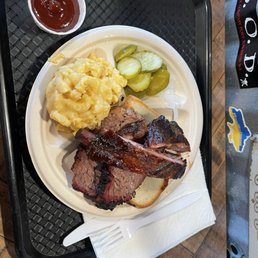 Two-meat plate with ribs, brisket, and mac&cheese Two-meat plate with ribs, brisket, and mac&cheese