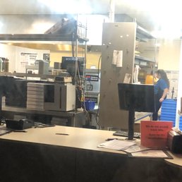 Employees just chillin' while I am outside banging on the glass door for them to open. The music was so loud they couldn't hear a thing.