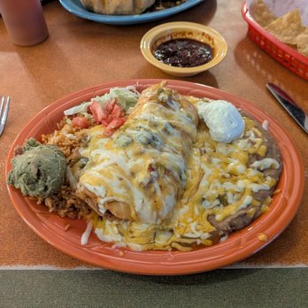 Los Cuates - Chicken and green chile chimichanga. - New Mexican Cuisine Near Me - Albuquerque, New Mexico Los Cuates - Chicken and green chile chimichanga. - New Mexican Cuisine Near Me - Albuquerque, New Mexico