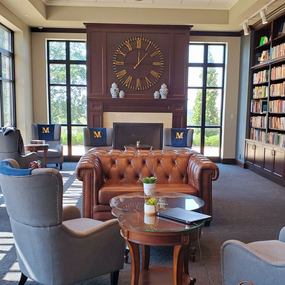 Tomlinson Cafe - a view of a library with a clock on the wall - Cafes Near Me - Kansas City, Missouri Tomlinson Cafe - a view of a library with a clock on the wall - Cafes Near Me - Kansas City, Missouri