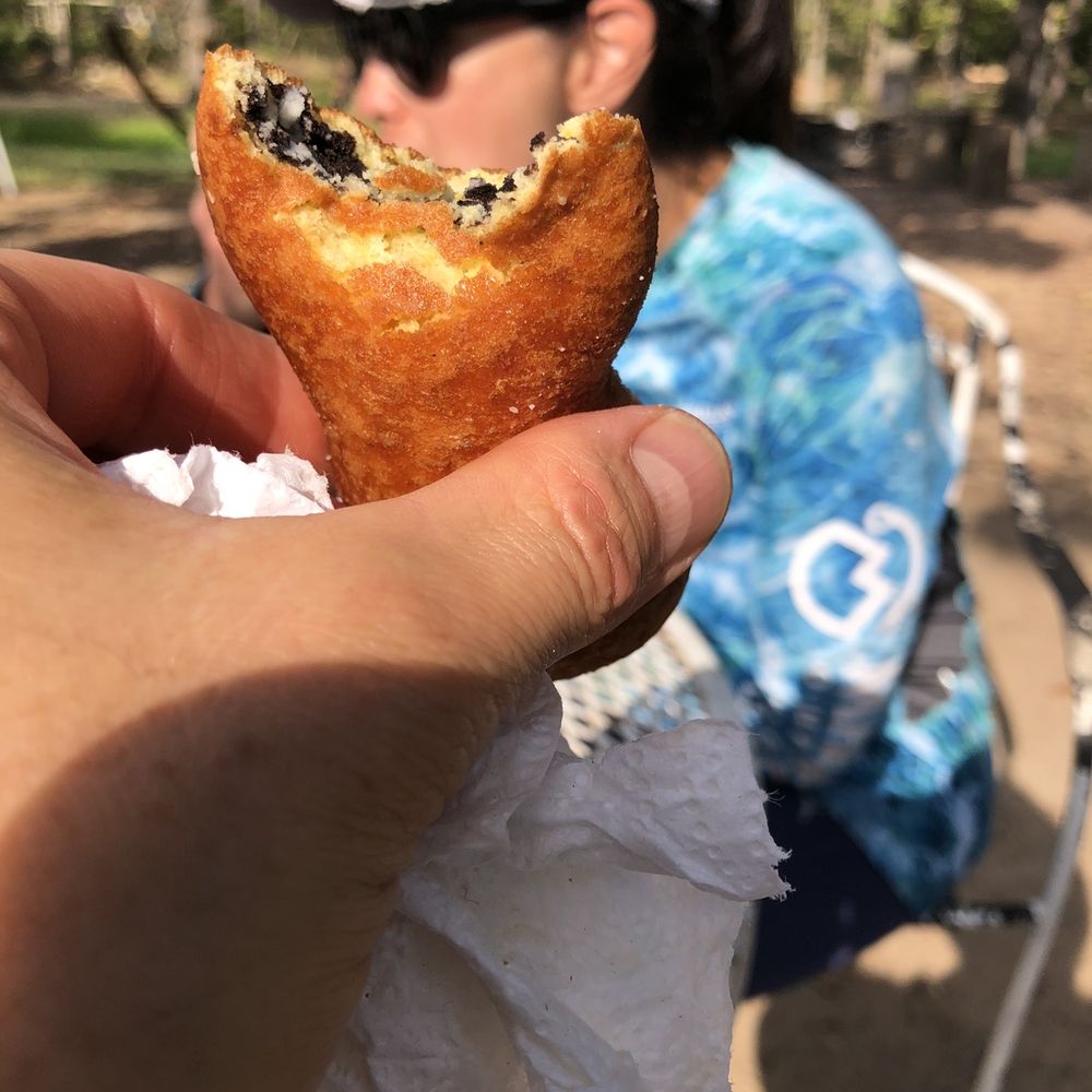 The Hochahut - a person holding a pastry - Tacos Near Me - Broken Bow, Oklahoma The Hochahut - a person holding a pastry - Tacos Near Me - Broken Bow, Oklahoma