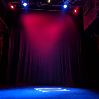Theatre Row - Minimal staging at "Miracle in Rwanda",  The white "box" in the middle of the stage was the size of the bathroom that 8 ppl hide. - Performing Arts Near Me - New York, New York