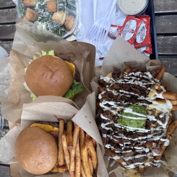 Chicana - All the goods! Caesar salad, asada fries, Cali dreamin burger and Wild West burger - Vegan Near Me - Fullerton, California Chicana - All the goods! Caesar salad, asada fries, Cali dreamin burger and Wild West burger - Vegan Near Me - Fullerton, California