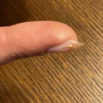 The Beauty Lounge - Poorly filed nail + chip (hard to see though). - Nail Salons Near Me - San Francisco, California The Beauty Lounge - Poorly filed nail + chip (hard to see though). - Nail Salons Near Me - San Francisco, California