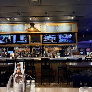 The Distillery Restaurant Victor - A view of the bar from our table. - Sports Bars Near Me - Victor, New York The Distillery Restaurant Victor - A view of the bar from our table. - Sports Bars Near Me - Victor, New York