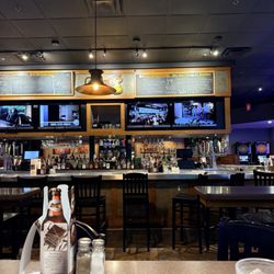 The Distillery Restaurant Victor - A view of the bar from our table.