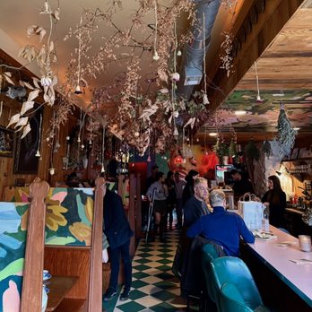 Tina's - people sitting at tables in a restaurant - Bars Near Me - Pittsburgh, Pennsylvania