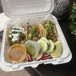 Salmon, shrimp, and tilapia tacos