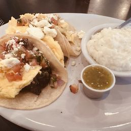 Breakfast tacos with burnt ends and a side of grits Breakfast tacos with burnt ends and a side of grits