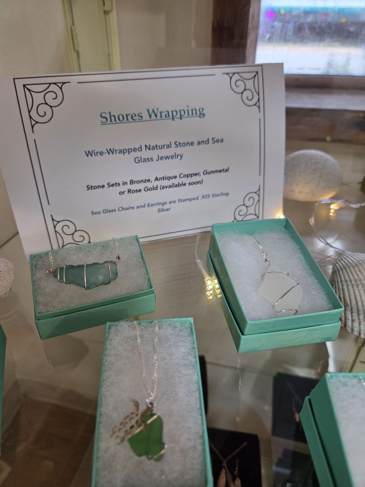 Feather and Fade Hair Studio Logo