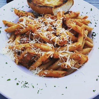 One Love Cafe - Spicy Italian sausage pasta with garlic bread - Cafes Near Me - Gainesville, Florida One Love Cafe - Spicy Italian sausage pasta with garlic bread - Cafes Near Me - Gainesville, Florida