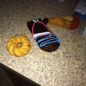 Voodoo Doughnut - Voodoo doll doughnut looks nothing like a voodoo doll or any picture on website - Donuts Near Me - Denver, Colorado Voodoo Doughnut - Voodoo doll doughnut looks nothing like a voodoo doll or any picture on website - Donuts Near Me - Denver, Colorado