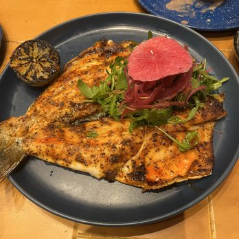 La Fisheria - Perfectly seasoned and cooked branzino. - Seafood Near Me - Houston, Texas La Fisheria - Perfectly seasoned and cooked branzino. - Seafood Near Me - Houston, Texas