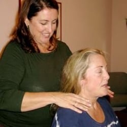Reimer  Wellness Center - Dr. Mary Reimer Adjusts a Patient