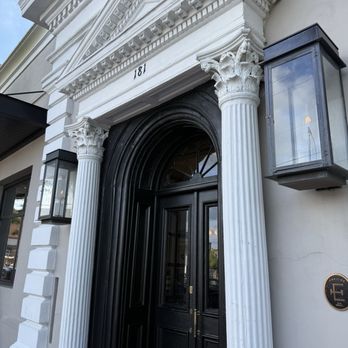 Emeline - Emeline entrance with gaslights - Hotels Near Me - Charleston, South Carolina