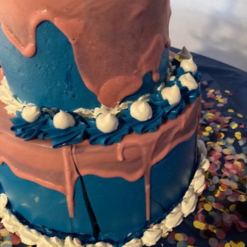 La Luce Pastry Shop - a three tiered cake with icing and sprinkles - Bakeries Near Me - Dedham, Massachusetts