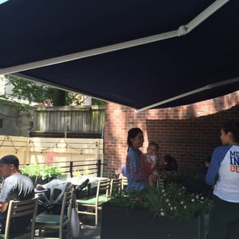 French Louie - Backyard garden seating area - French Near Me - Brooklyn, New York French Louie - Backyard garden seating area - French Near Me - Brooklyn, New York