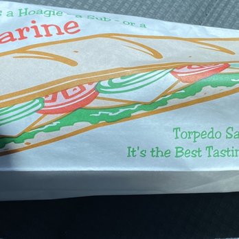 Sub Shop - a sub sandwich wrapped in white paper - Sandwiches Near Me - Atwater, California Sub Shop - a sub sandwich wrapped in white paper - Sandwiches Near Me - Atwater, California
