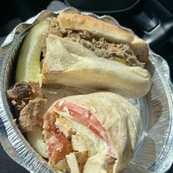 Madison Deli - Half of a chicken bacon wrap and half of a 83. Cuban Sandwich