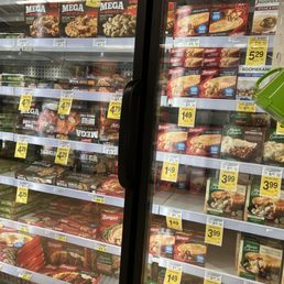 a frozen section of a grocery store a frozen section of a grocery store