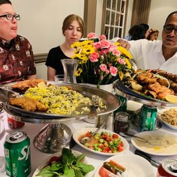 Yummy fish, rice and veggie dishes amid a beautiful floral centerpiece :) ! Yummy fish, rice and veggie dishes amid a beautiful floral centerpiece :) !