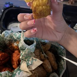 delicious cajun corn, hot boneless and garlic parm